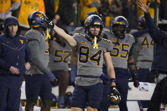 Nov 25, 2023; Waco, Texas, USA; West Virginia Mountaineers wide receiver Hudson Clement (84) reacts after a first down catch against the Baylor Bears during the first half at McLane Stadium.